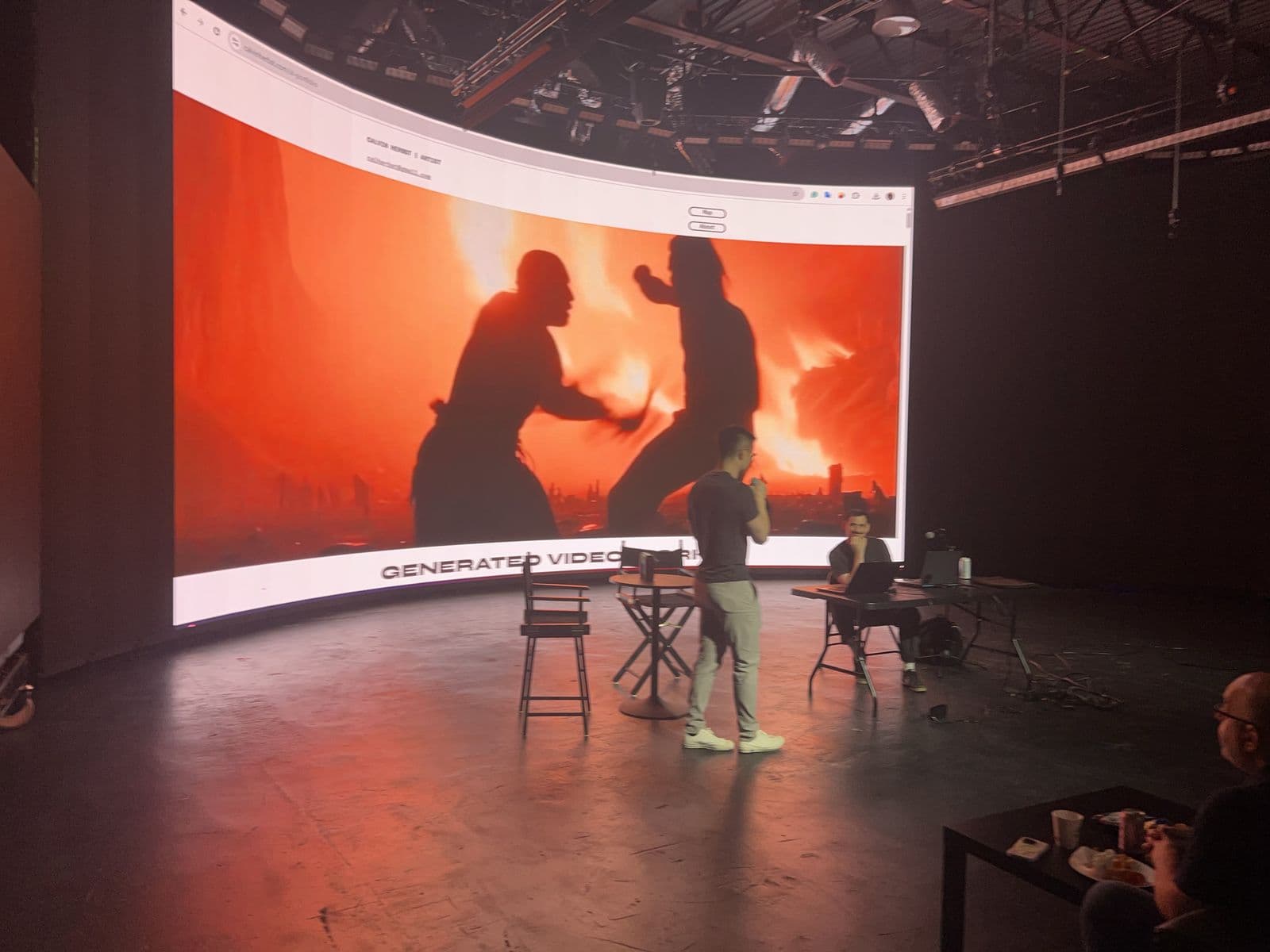 Generated video playing across the curved LED wall